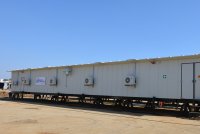 An E-House being installed on site by Shaw Controls. 