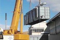 The complete 35 t packaged diesel generator set being lifted for loading onto transport vehicle